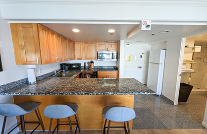 Modern Granite Kitchen and Entrance               