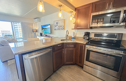 Kitchen w/ Breakfast Bar and Living Area Views